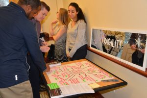 HESA students examine an exhibit on white fragility in 2018.